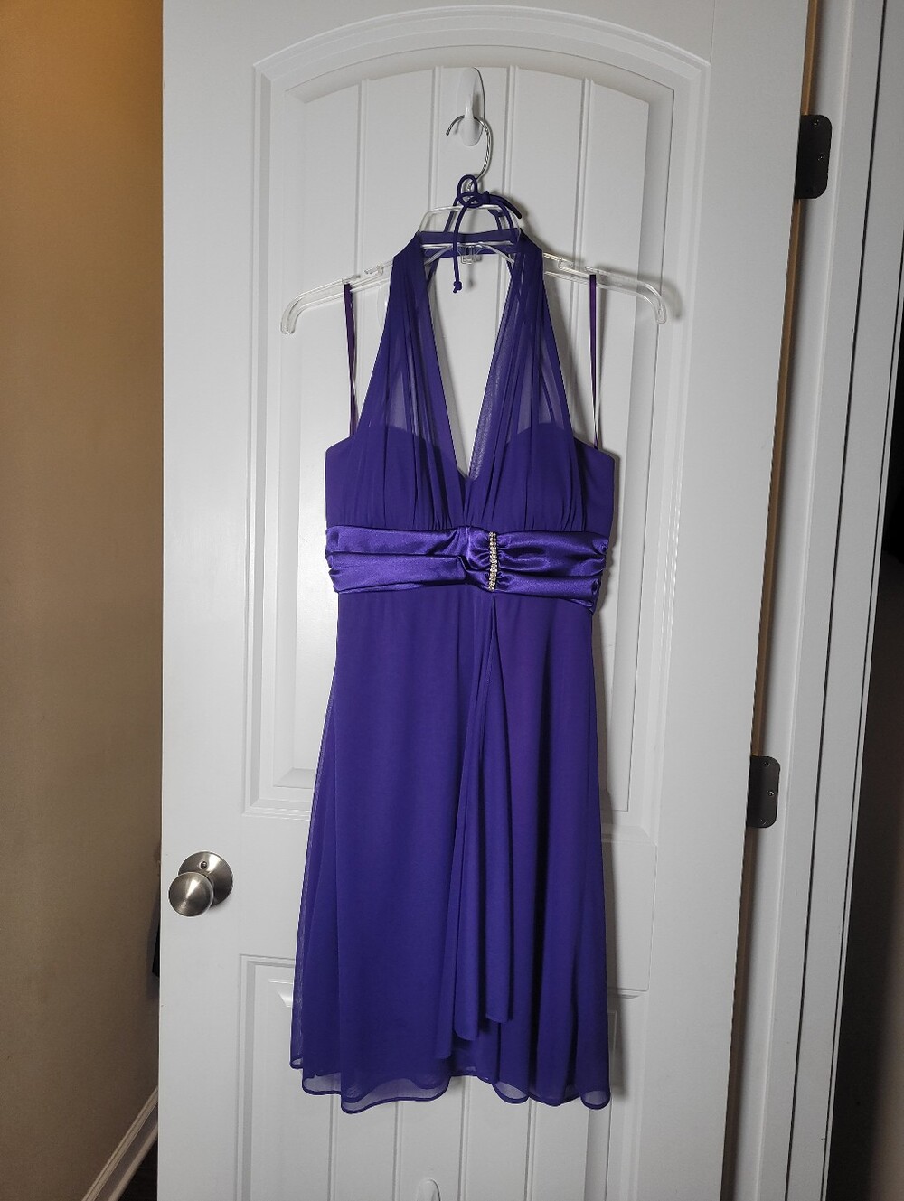 Onyx Nite Elegant Purple Halter Cocktail Dress featuring a rhinestone accent.